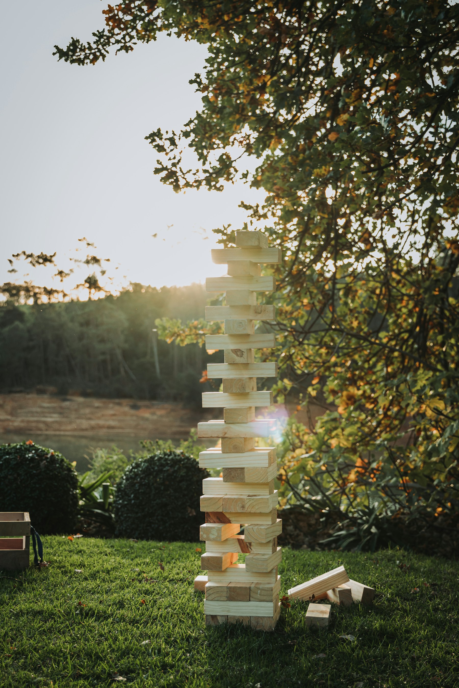 Illustrative editorial view of a giant wooden lawn game for the Outdoor Games Station