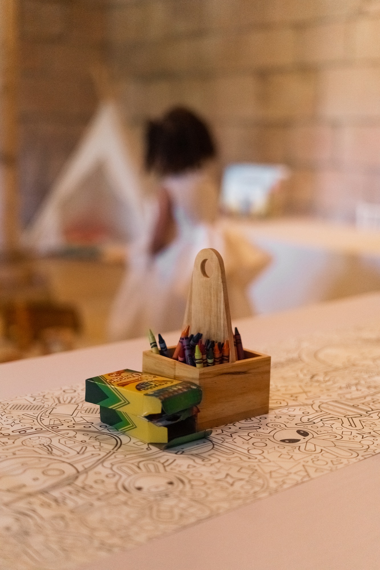 Children's coloring and activity station at a wedding or event