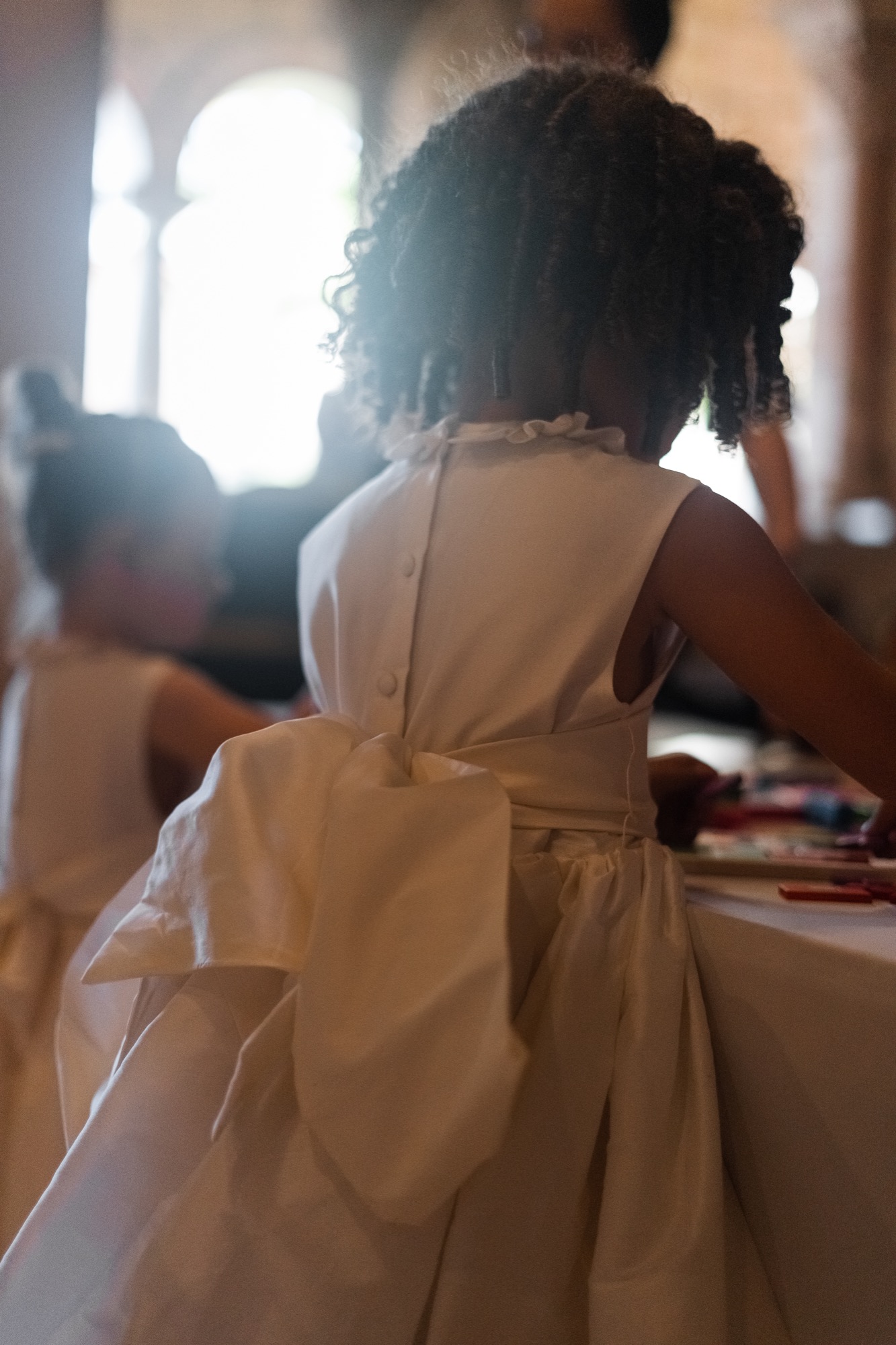 Flower girl playing at the kids lounge